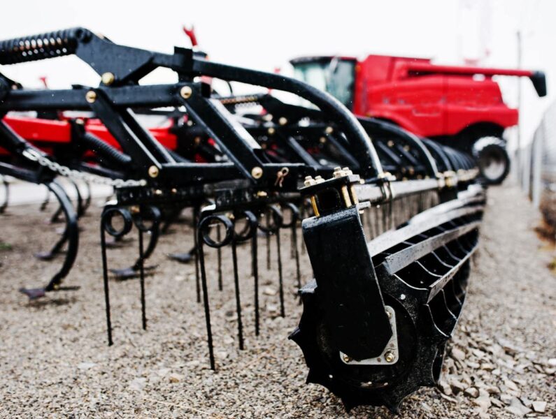 new-red-agricultural-seeder-close-up-view